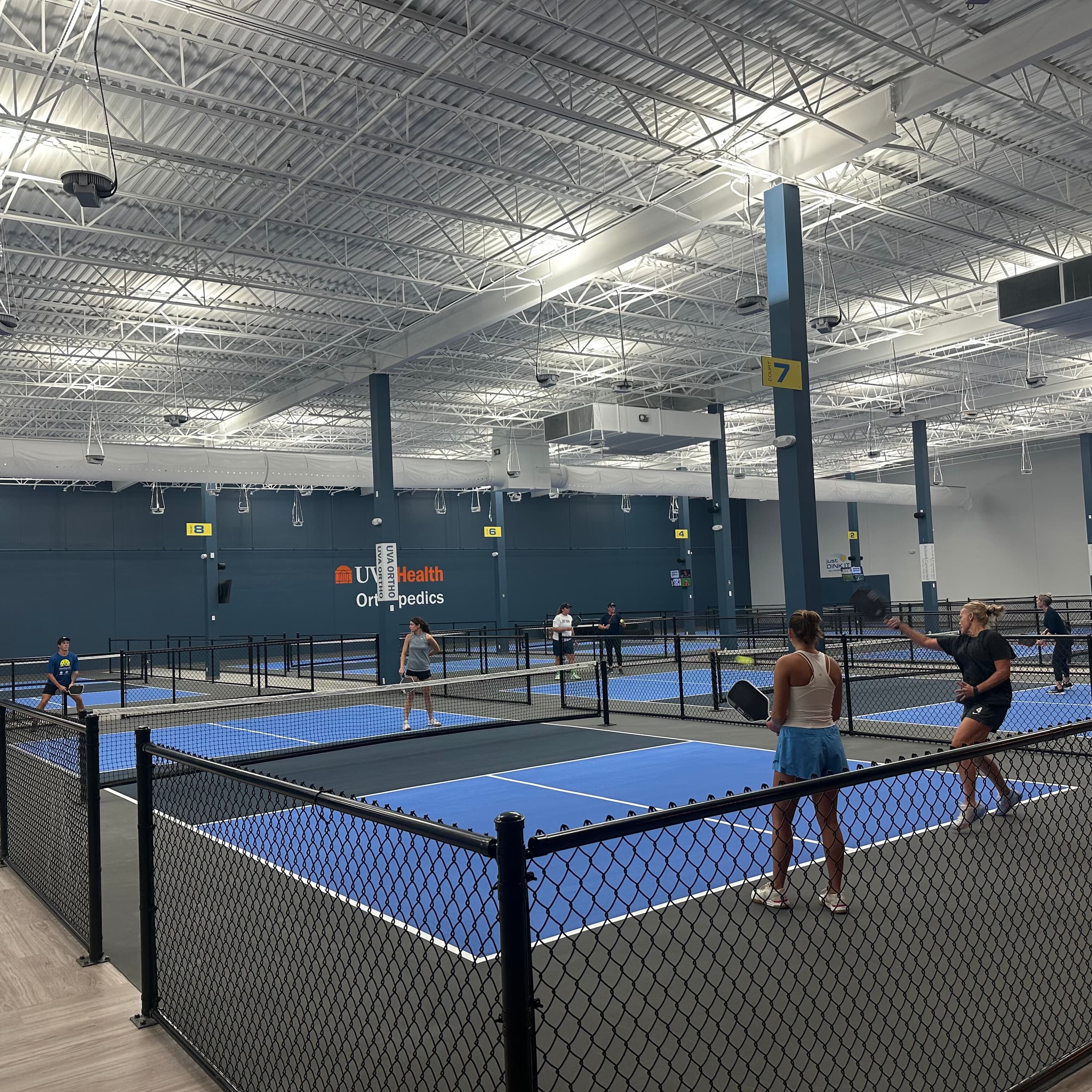 Action on the courts at cvilleSMASH indoor pickleball facility